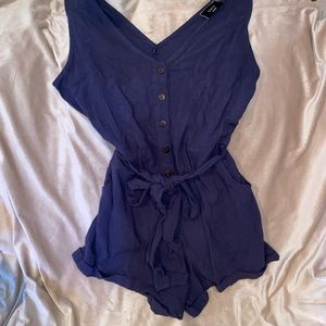 VICI navy romper with waist tie and brown buttons down front
